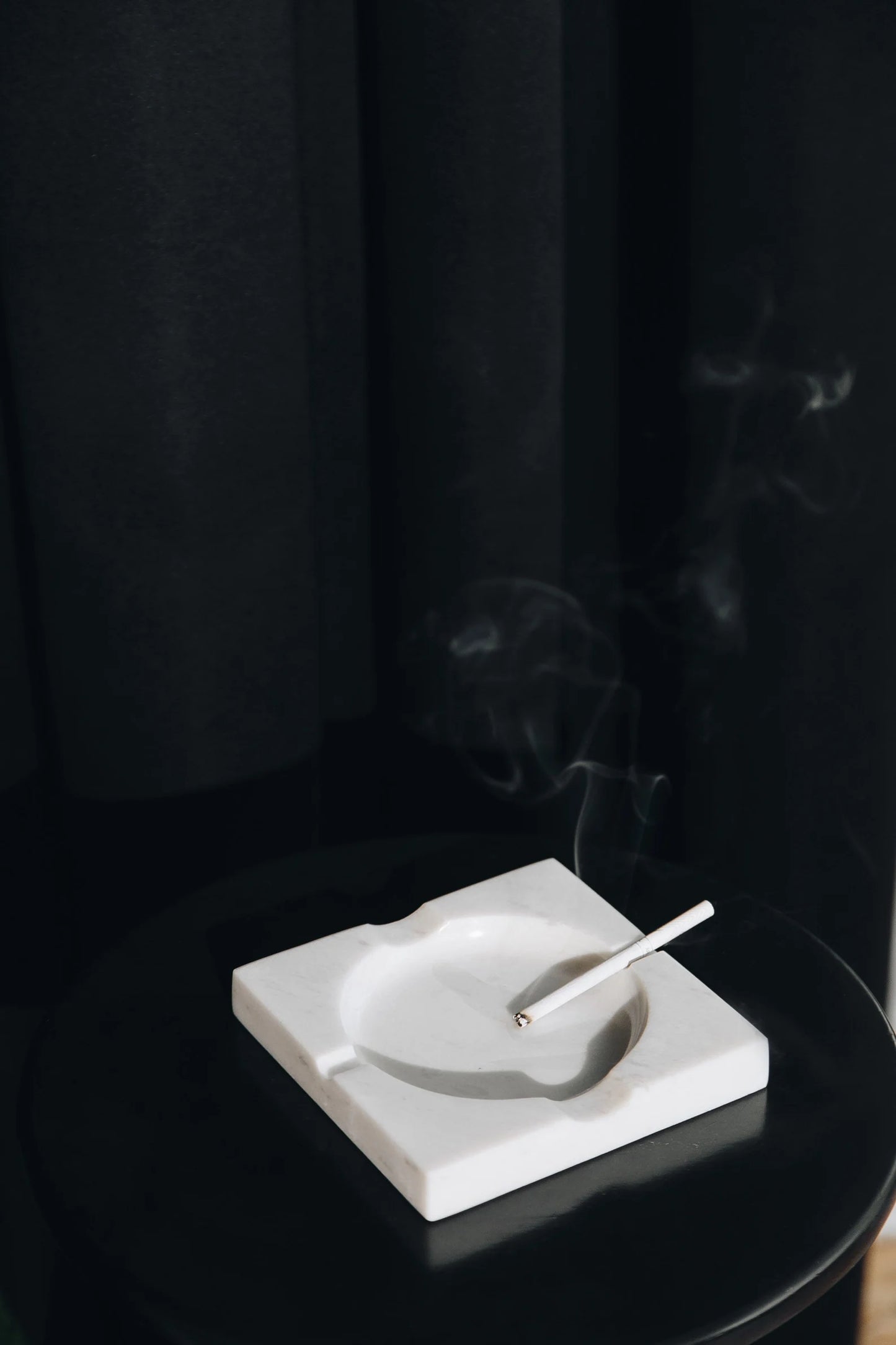 A stylish square marble ashtray