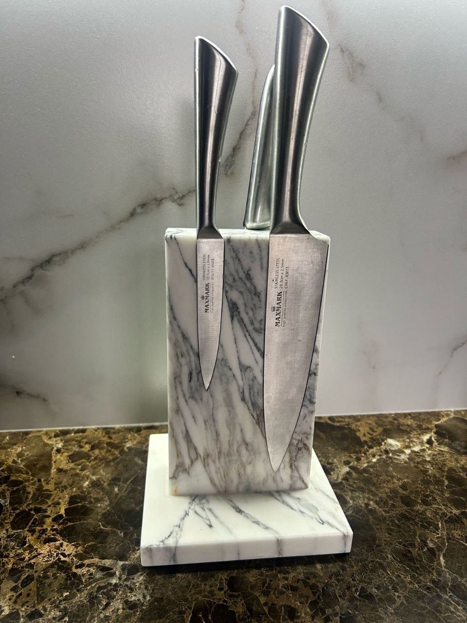 A magnetic knife stand made of marble