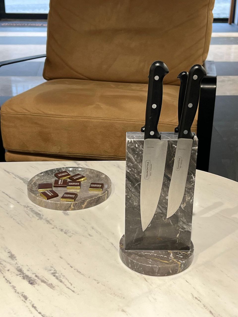 A magnetic knife stand made of marble