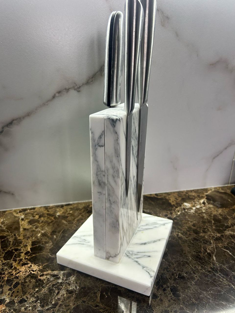 A magnetic knife stand made of marble